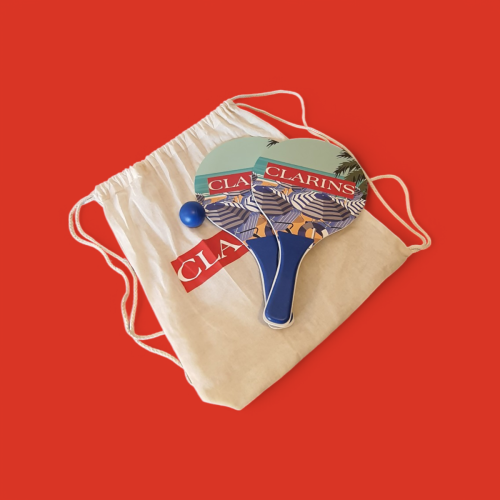 Clarins set da spiaggia racchettoni con pallina e sacca in cotone