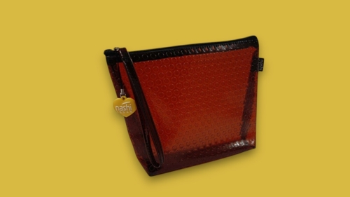 Pochette con palline in rilievo e tirazip personalizzato